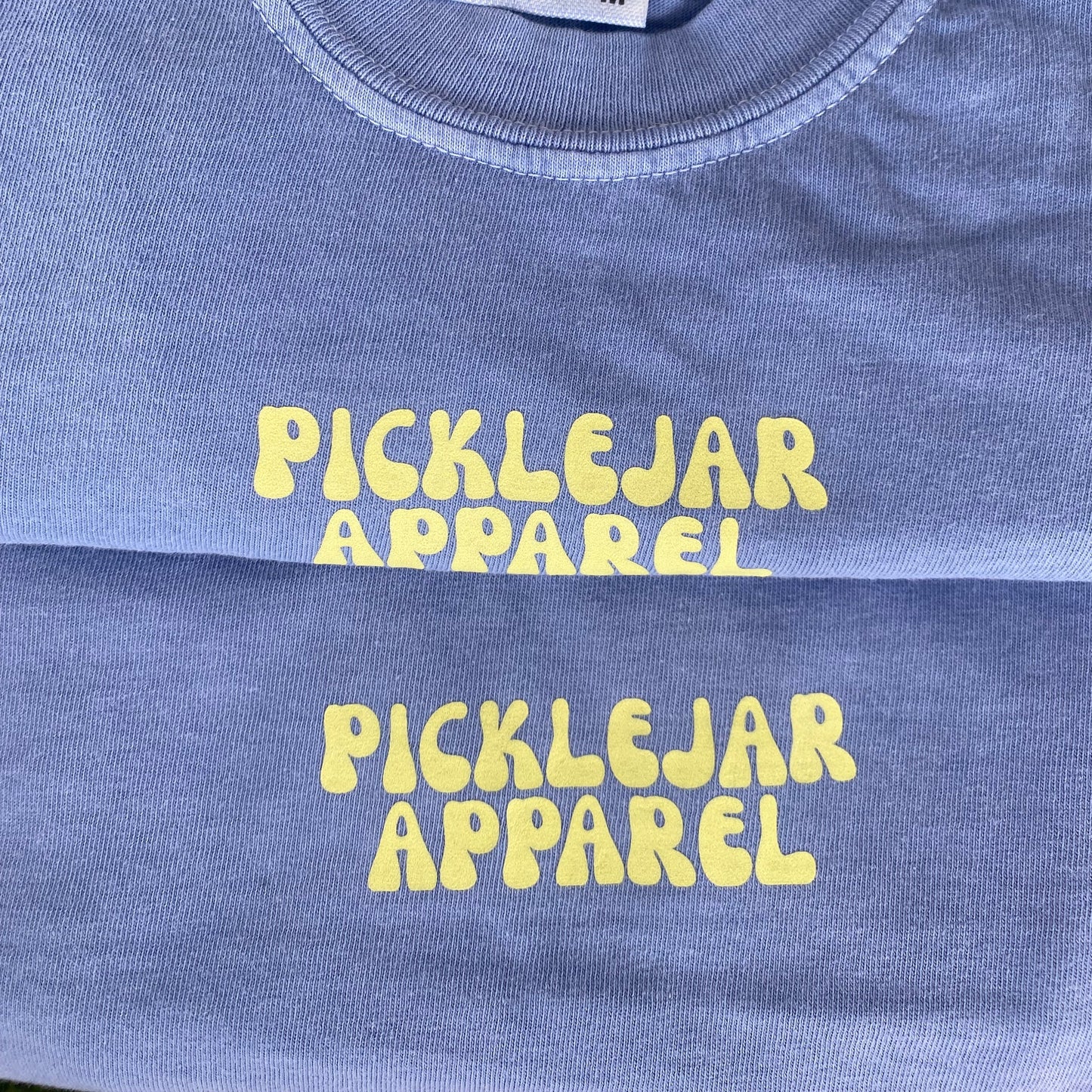 Blue Tee with Yellow writing