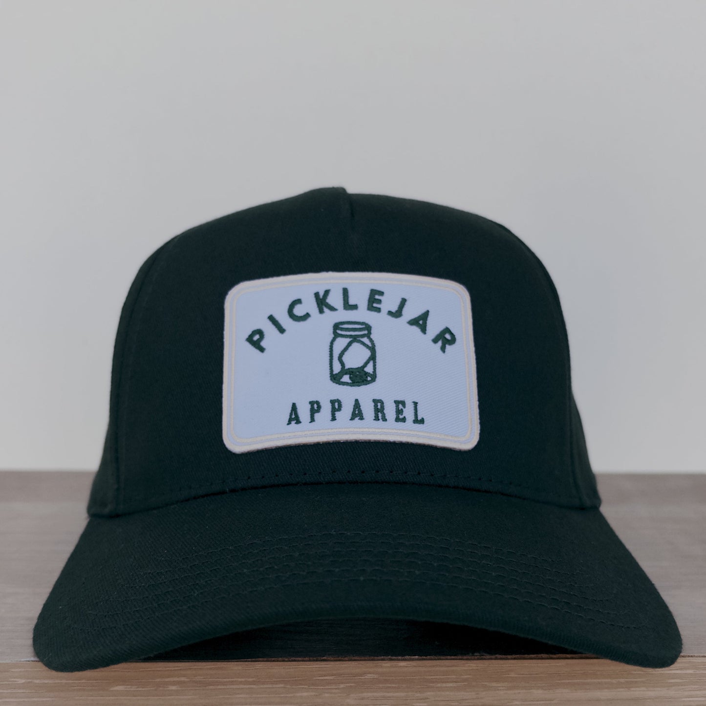 Green Baseball Hat with Cream Embroidered Patch