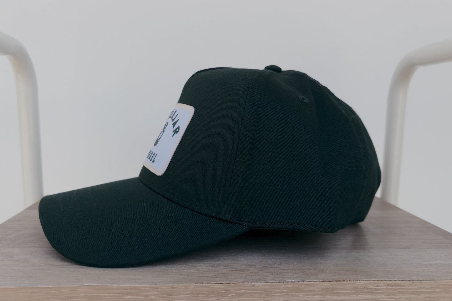 Green Baseball Hat with Cream Embroidered Patch