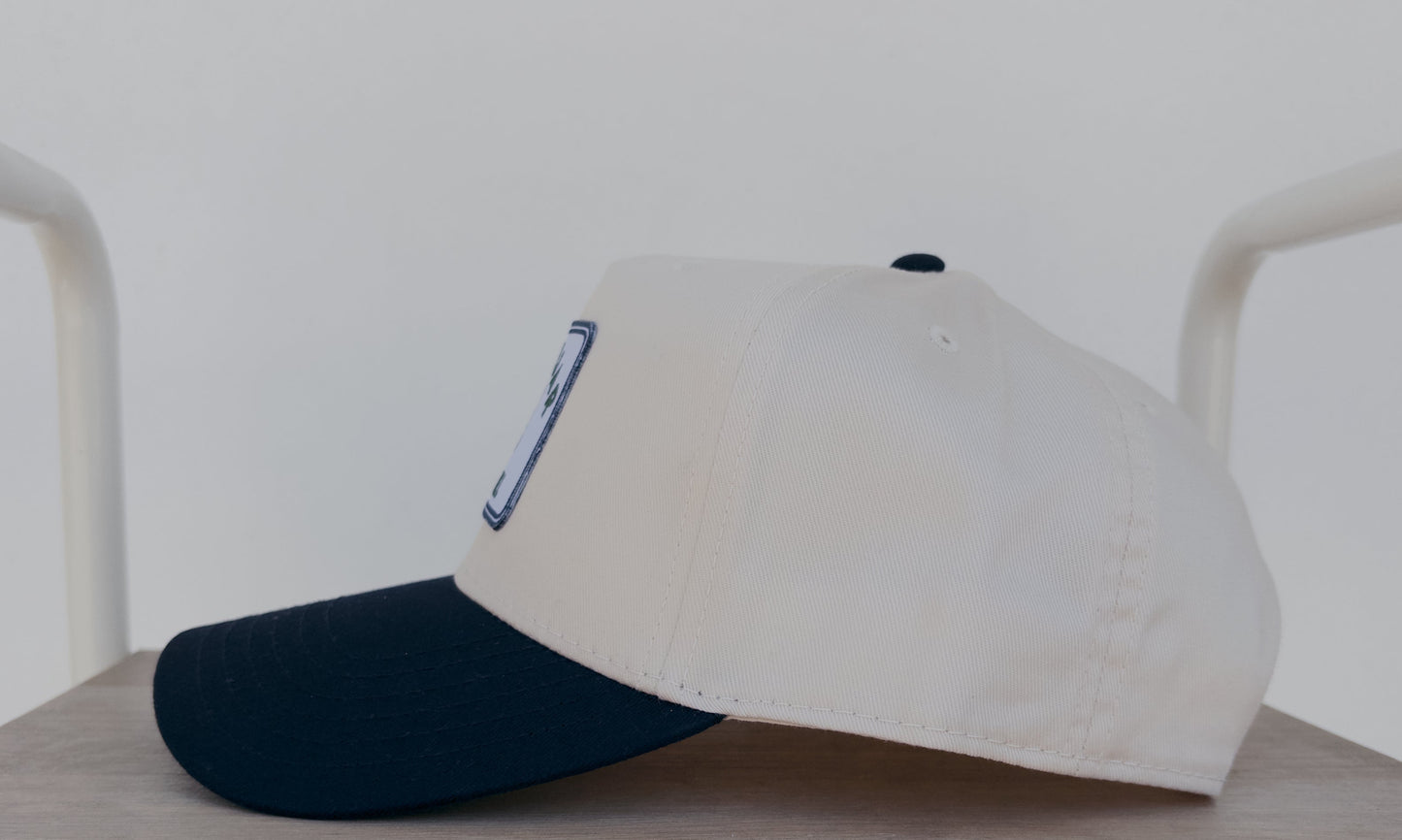 CHALCEDONY HAT: TWILL TRUCKER HAT WITH EMBROIDERED PATCH
